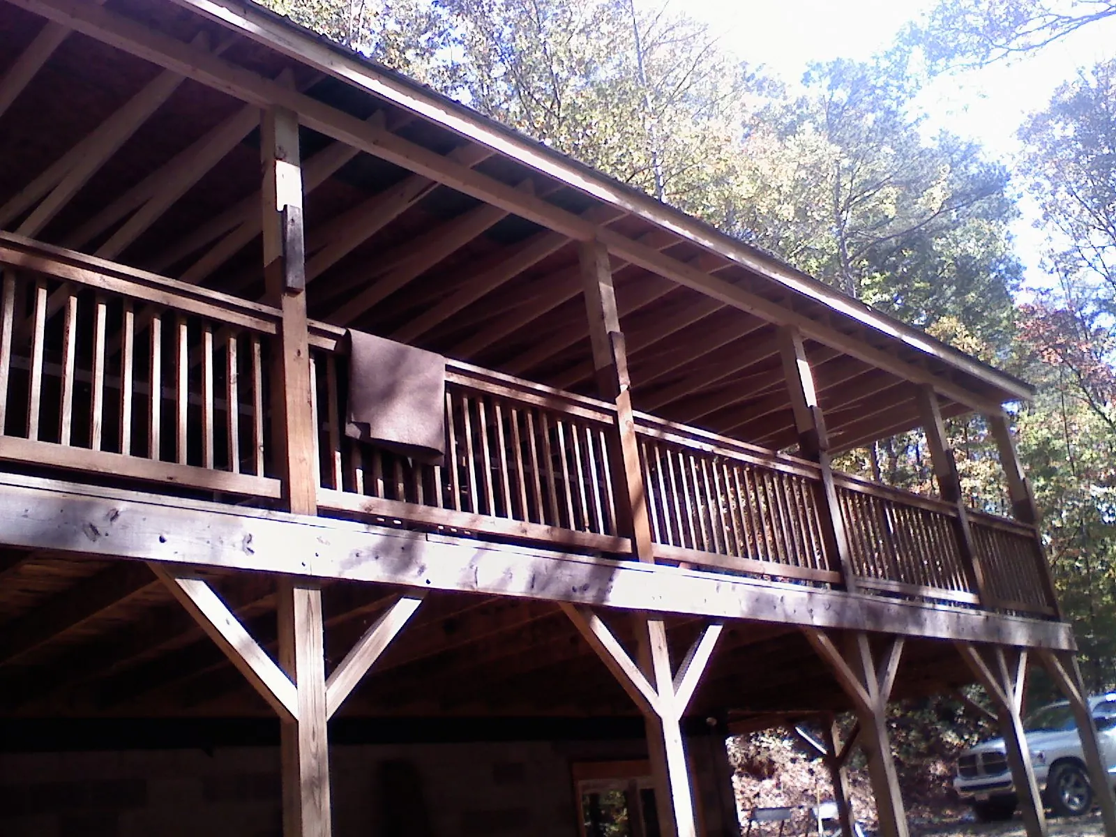 Timber framing under a new elevated porch and deck — Roof Leak Repair in Corona Del Mar by Roofing Brothers